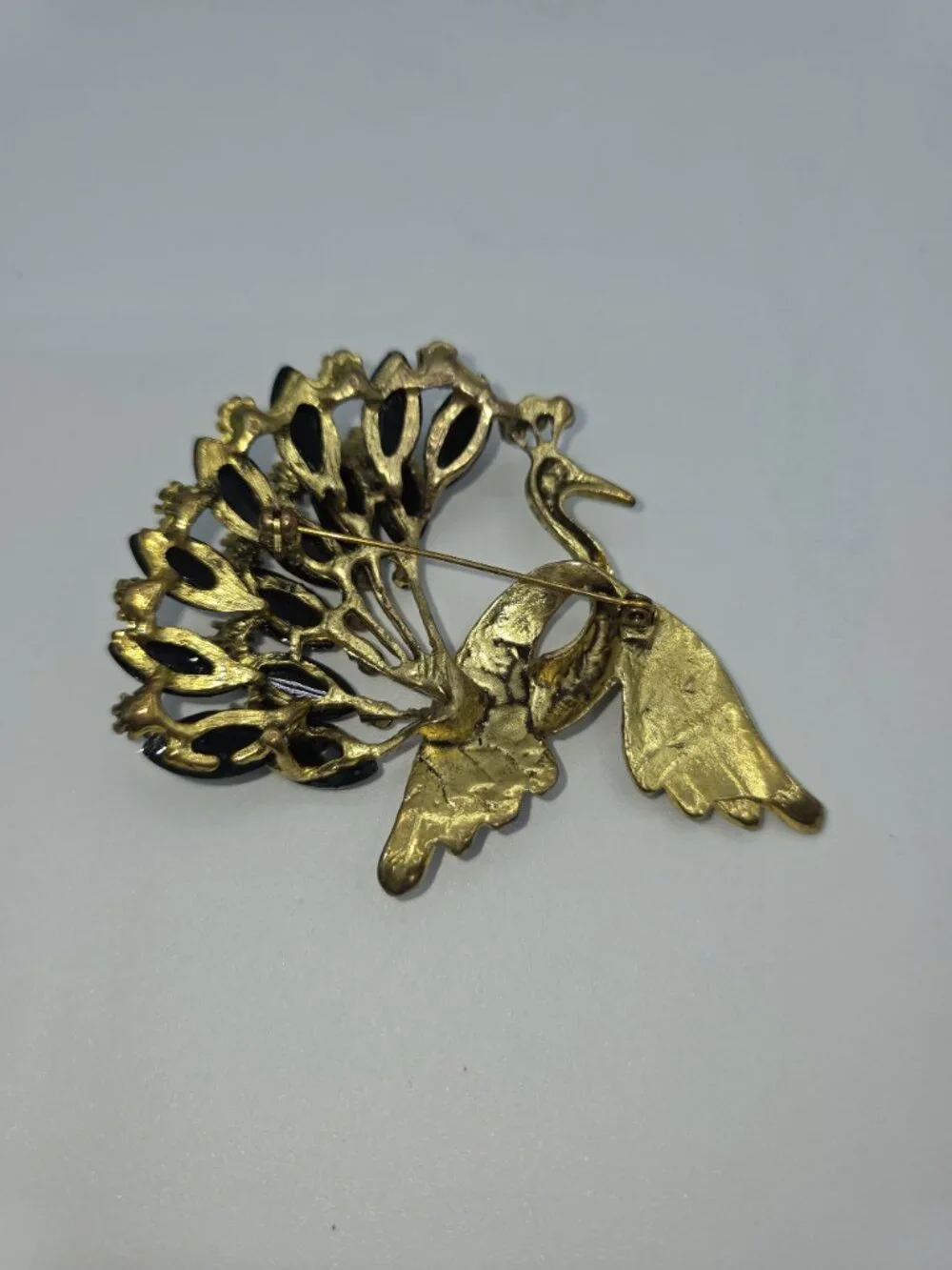 Gold-Tone Peacock Brooch With Rhinestone Wings & Black Gemstone Tail Feathers